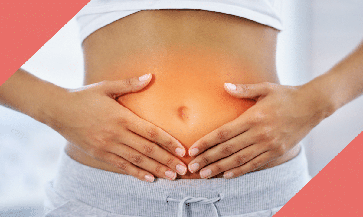 Woman with both hands on her stomach, with a warm glow showing gut discomfort in menopause
