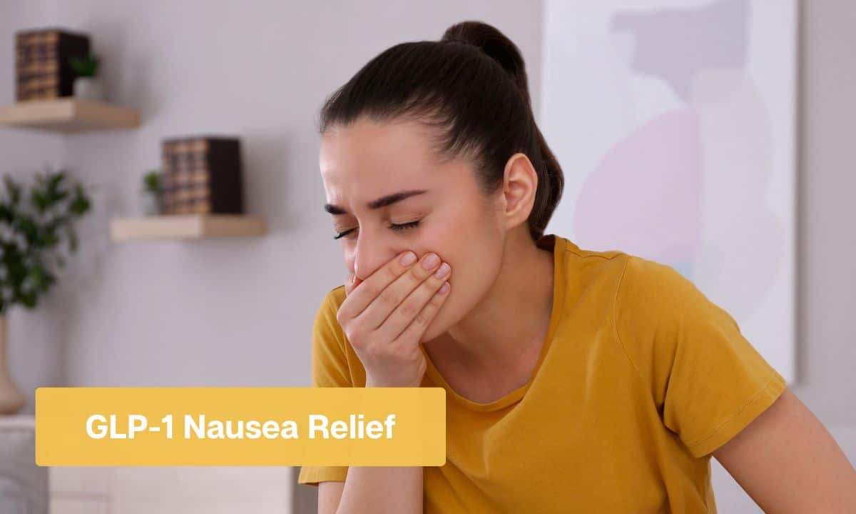 Woman feeling nauseous with her hand over her mouth, a common side effect of GLP-1 medications